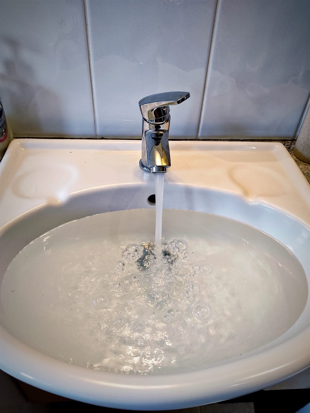 New basin tap running after installation