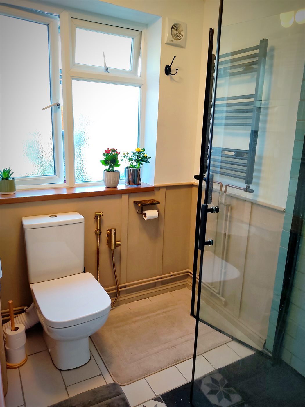 Toilet installation and bathroom plumbing finish