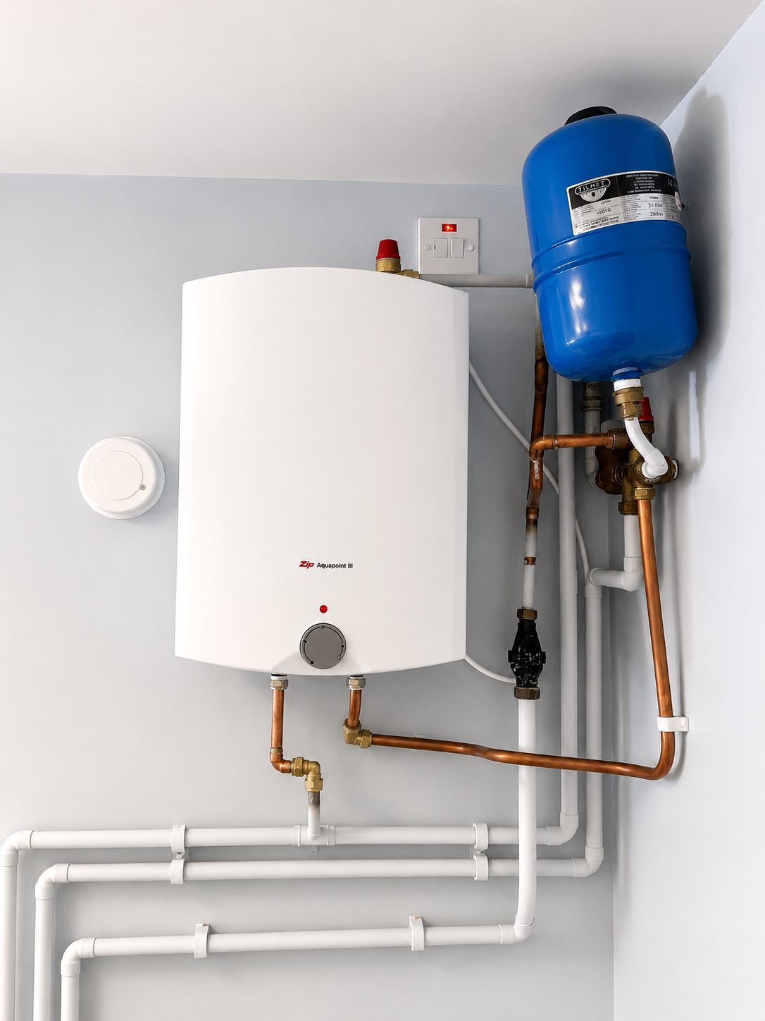 Overbasin unvented water heater installed with pipework